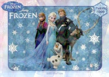 The characters Anna, Elsa, Kristoff, Sven, and Olaf from the movie Frozen standing against a blue snowflake background.