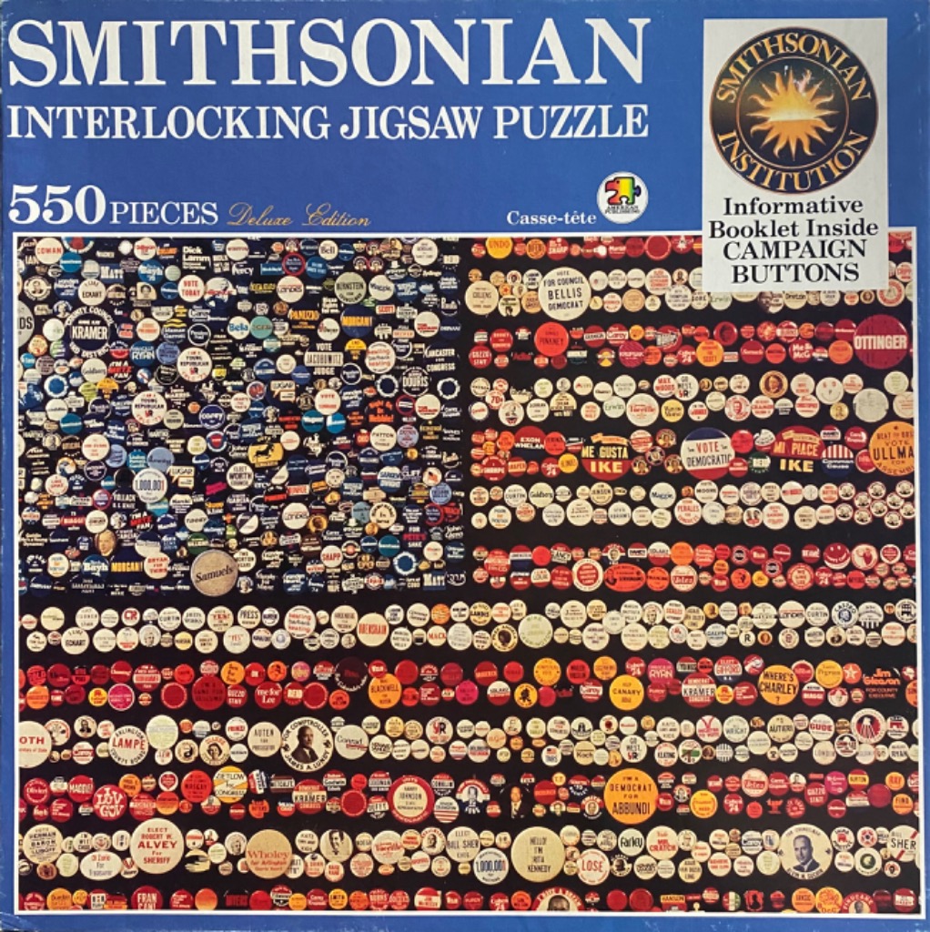 A collage of hundreds of circular political campaign buttons arranged to form the pattern of the American flag.