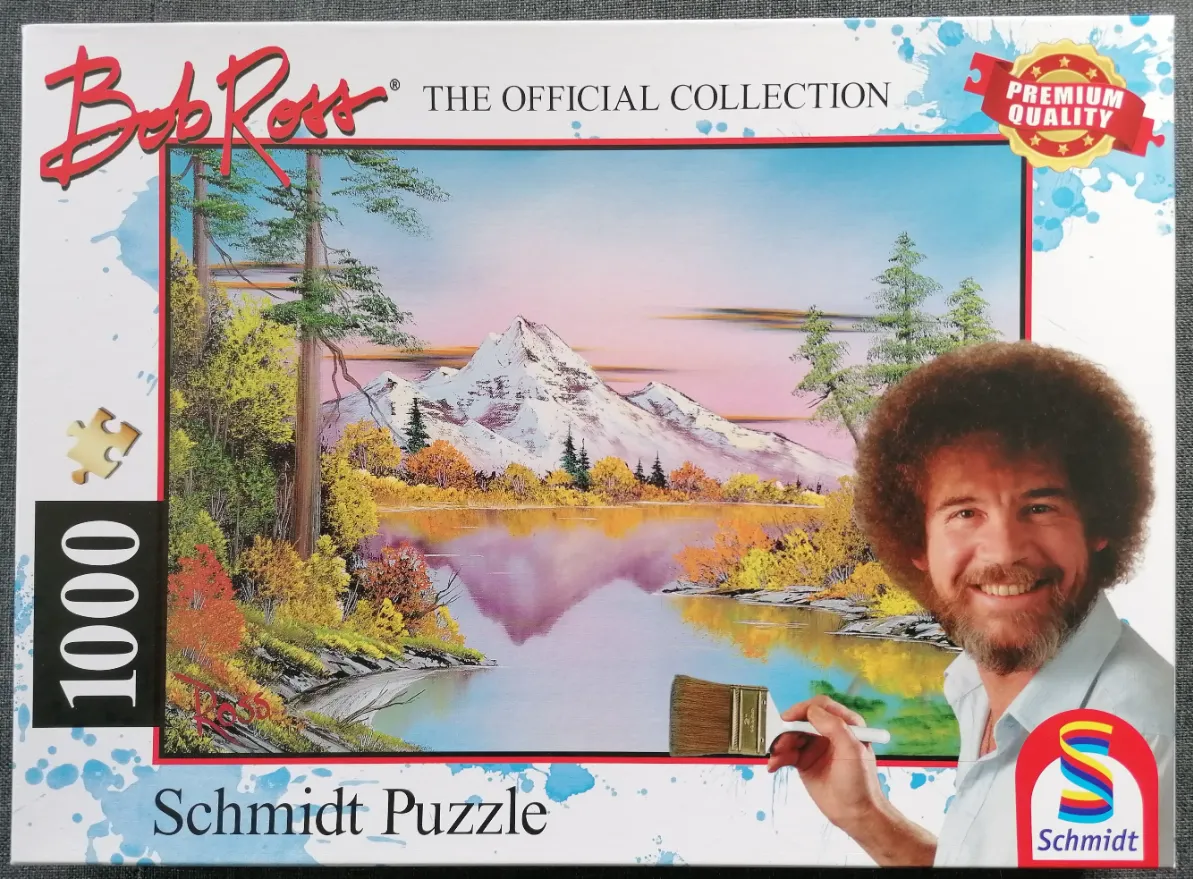 A Bob Ross oil painting of a snow-capped mountain reflecting in a tranquil lake, featuring autumn foliage and pine trees.