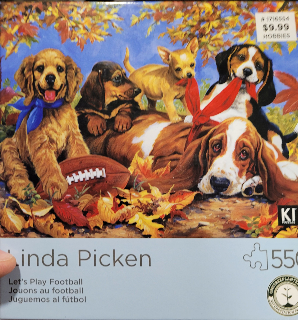 A colorful painting of five dogs of various breeds playing together outdoors among autumn leaves.