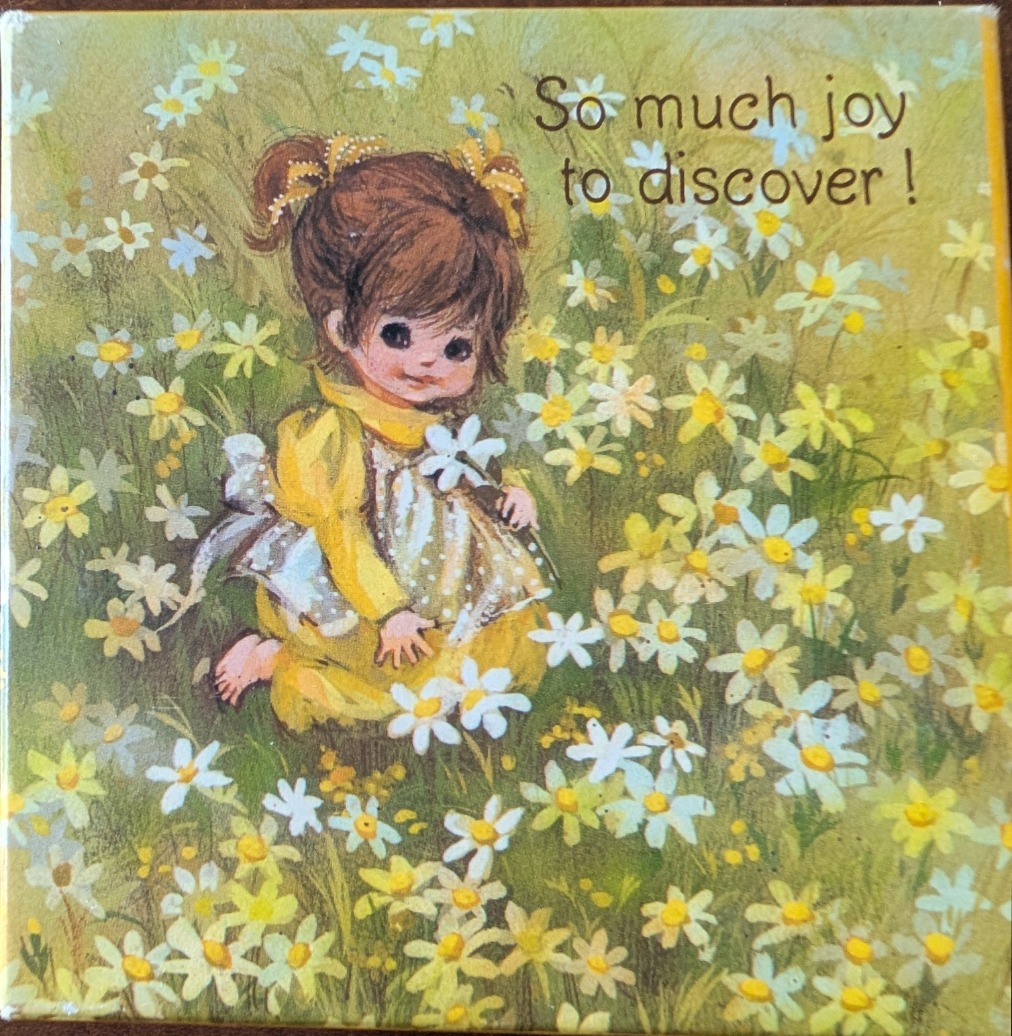 Vintage illustration of a young girl with brown hair in a yellow dress surrounded by white and yellow daisies.