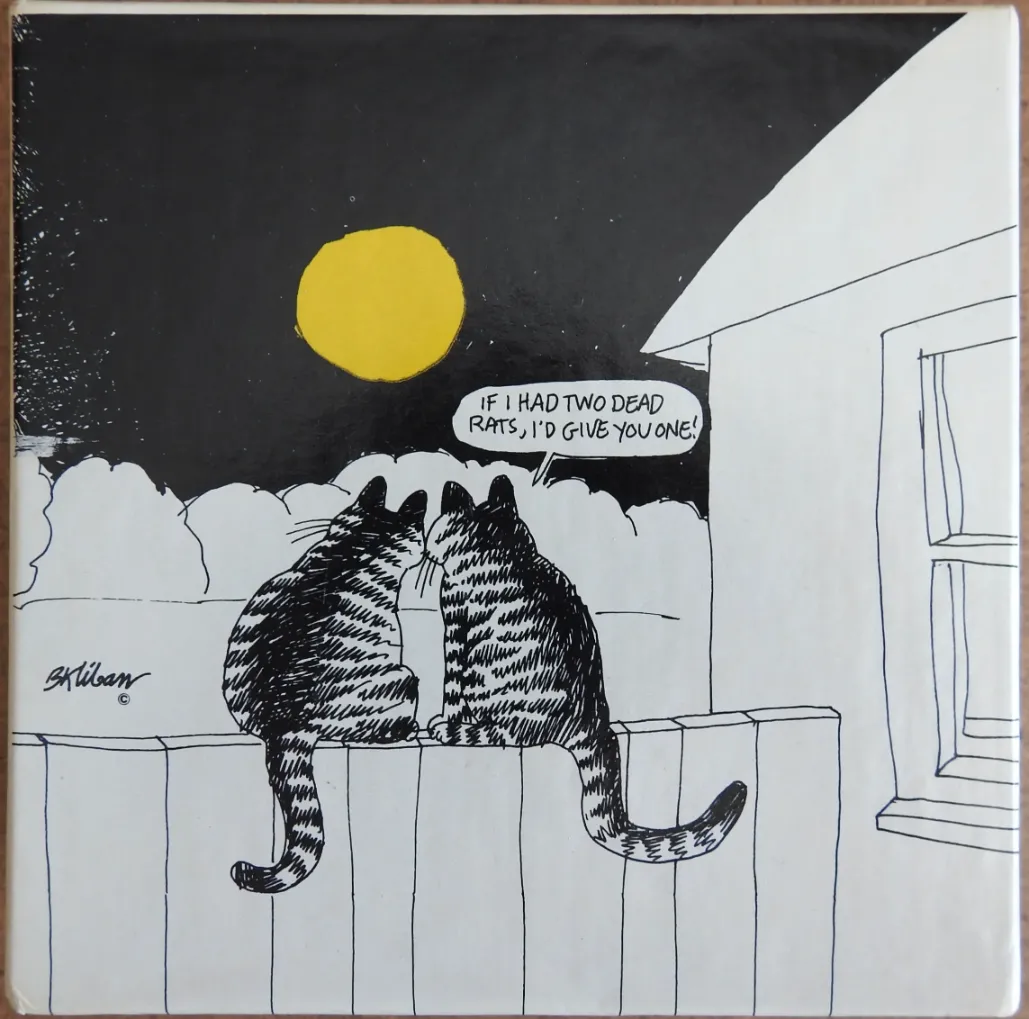 A whimsical black and white line drawing of two tabby cats sitting on a fence under a yellow moon.