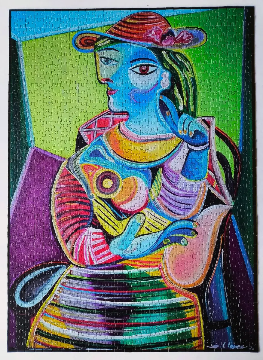 A vibrant cubist painting of a woman in a hat, characterized by bold, fragmented shapes and bright, contrasting colours.