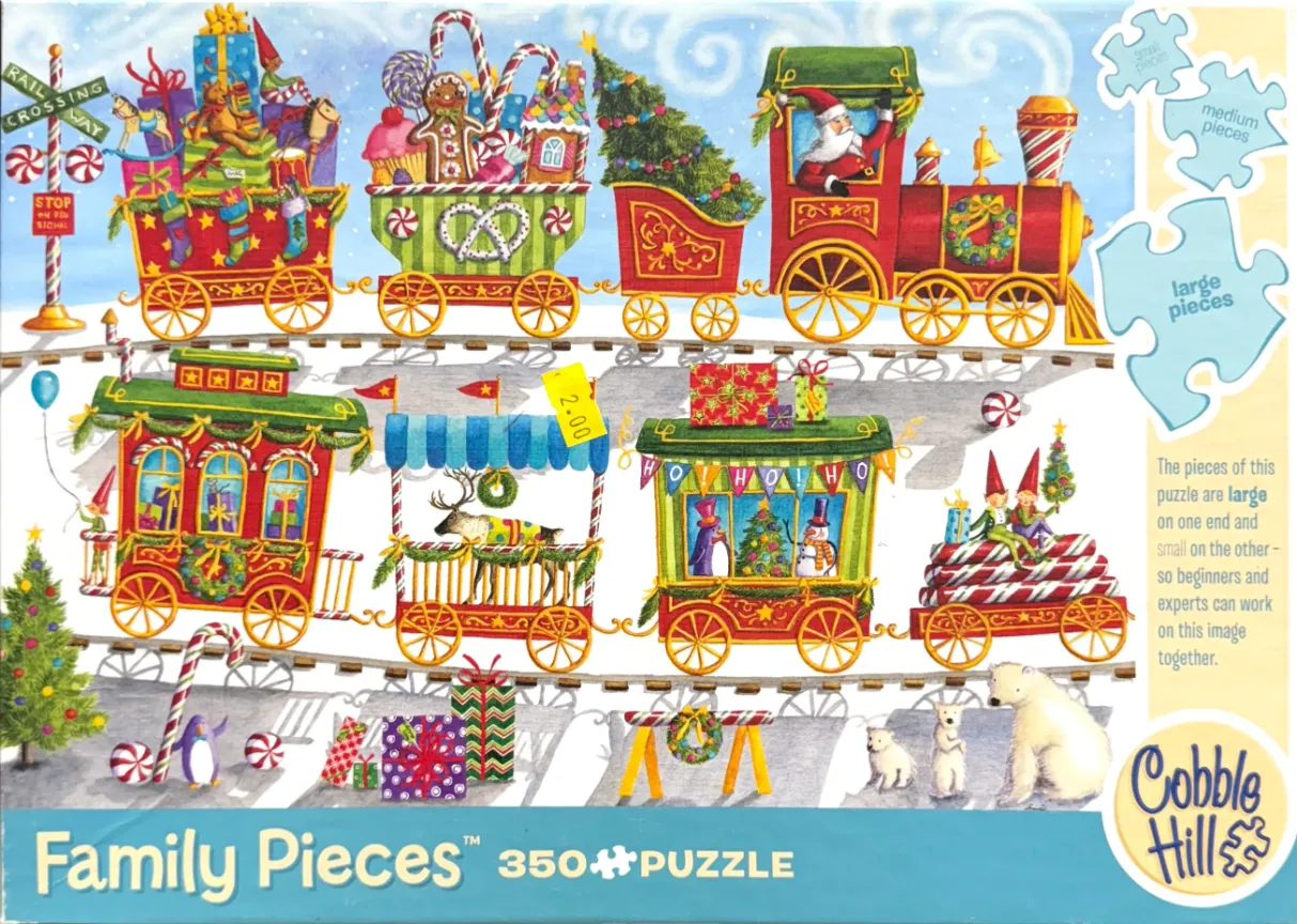 An illustration of a festive Christmas train carrying toys and holiday characters on snowy tracks.