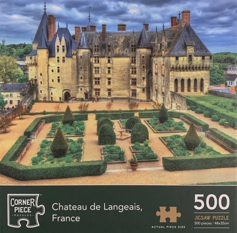 The historic Chateau de Langeais in France, featuring its stone towers and manicured formal gardens.