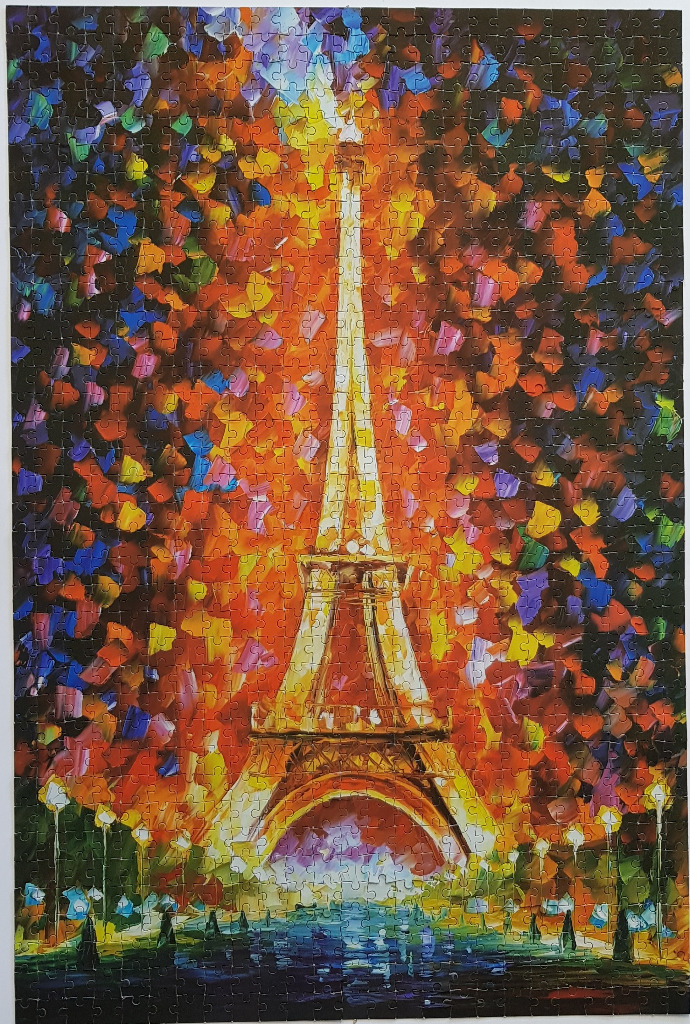 Impressionist oil painting of the Eiffel Tower glowing in sunset colors with thick, visible brushstrokes.