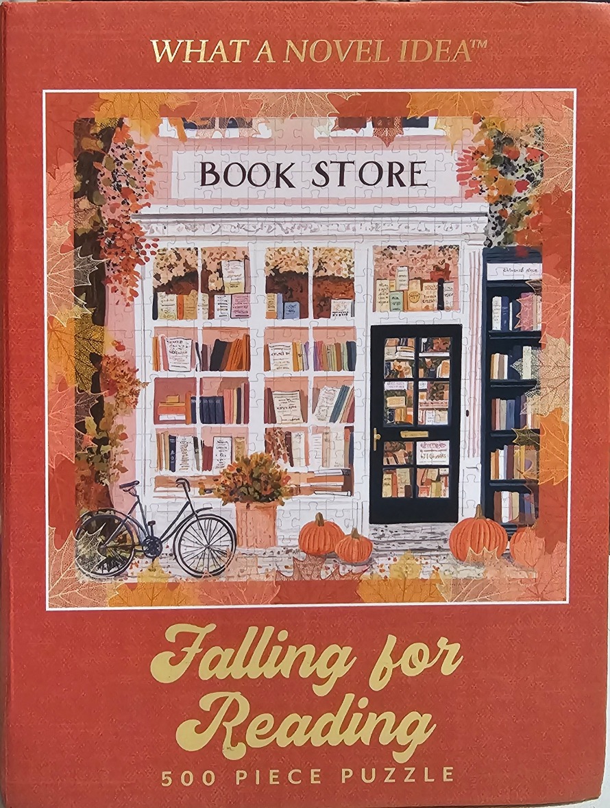 Illustration of a quaint bookstore storefront surrounded by autumn leaves, pumpkins, and a bicycle.