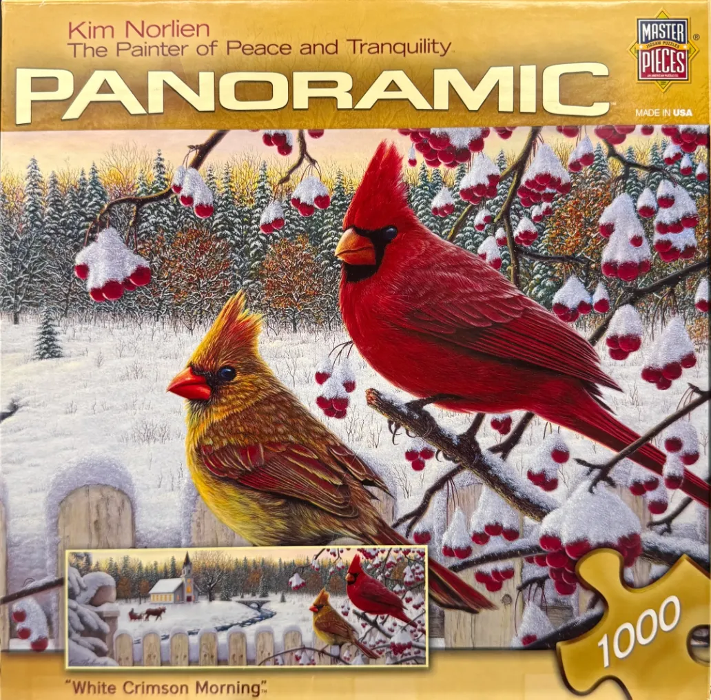 A male and female cardinal perched on a snowy branch with red berries in a winter landscape.