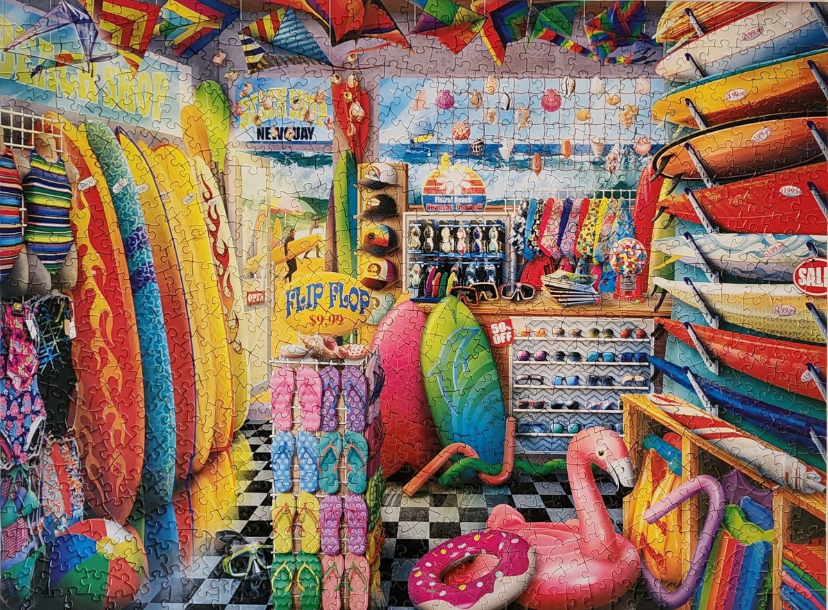 A colorful, cluttered surf shop filled with surfboards, flip flops, and beach accessories.