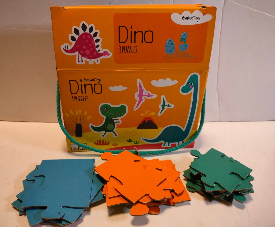 Cartoon illustration of friendly dinosaurs in a prehistoric landscape