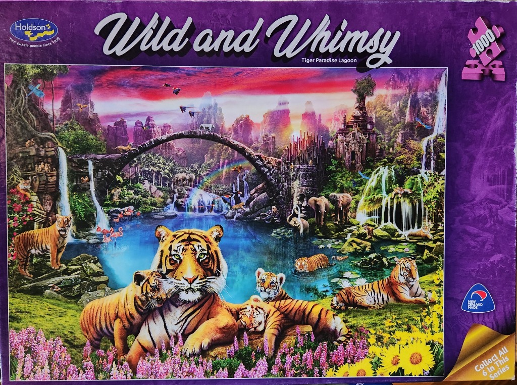 A lush jungle scene featuring multiple tigers, a stone bridge, and waterfalls under a vibrant sunset sky.