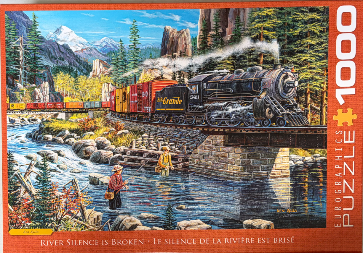A steam train crosses a bridge over a river where two people are fly fishing in a mountain landscape.
