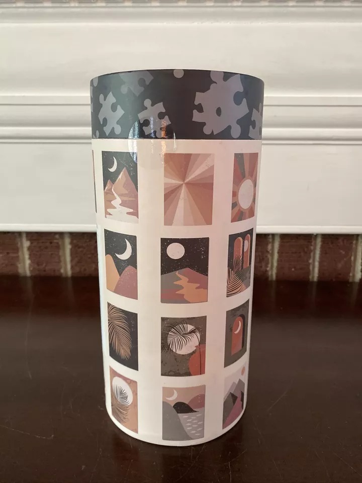 Boho-style grid artwork featuring celestial bodies, landscapes, and desert motifs in a warm, muted color palette.