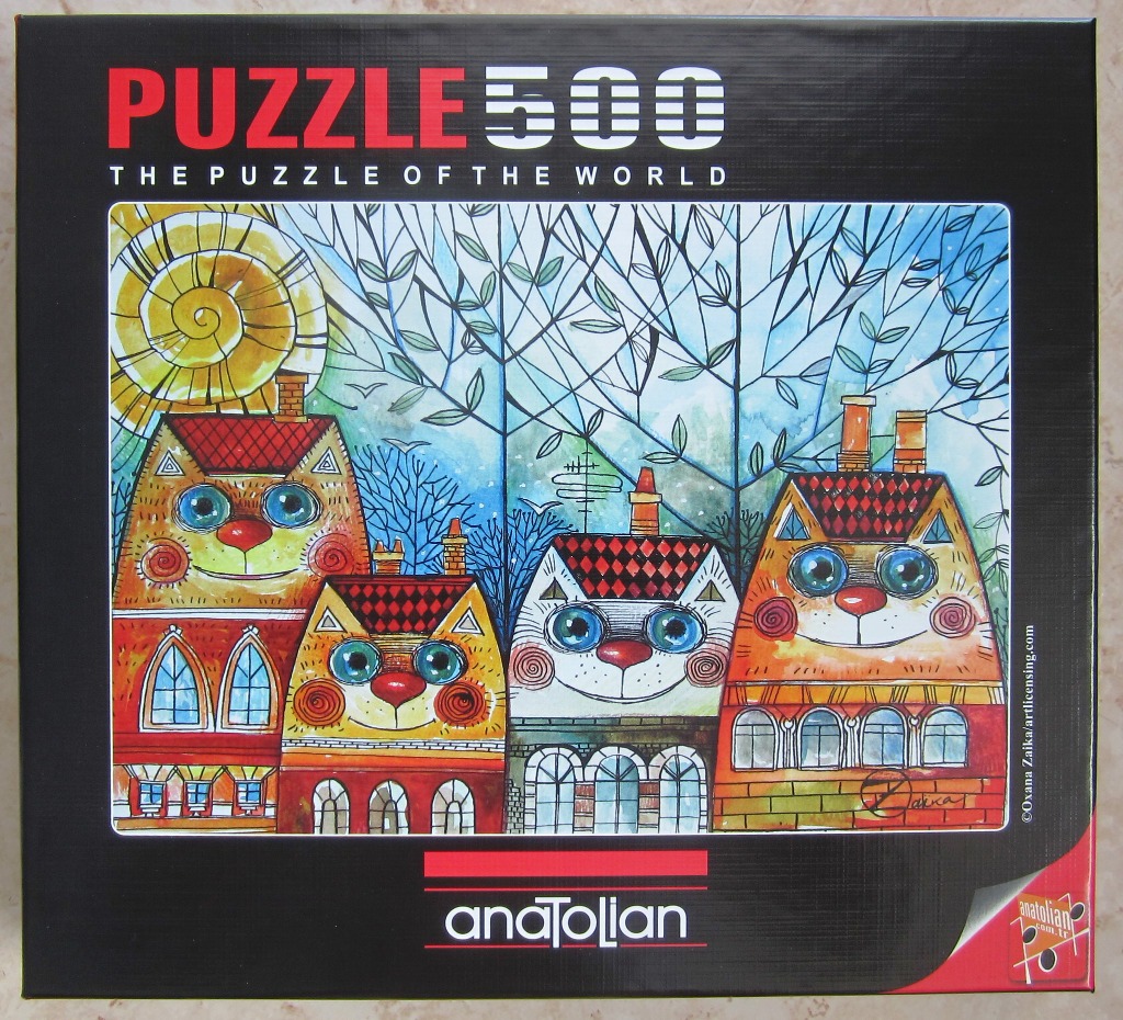 Whimsical illustration of four cat-shaped houses in a stylized, artistic village setting.