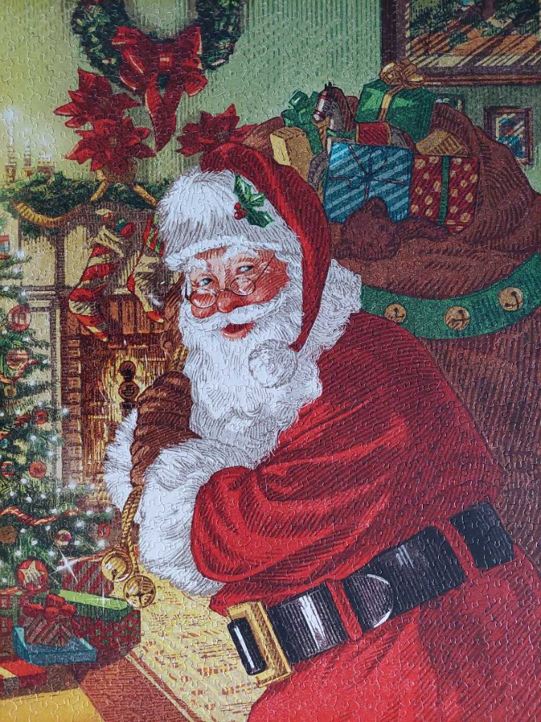 Illustration of a jolly Santa Claus standing by a fireplace, a Christmas tree, and a sack of gifts.