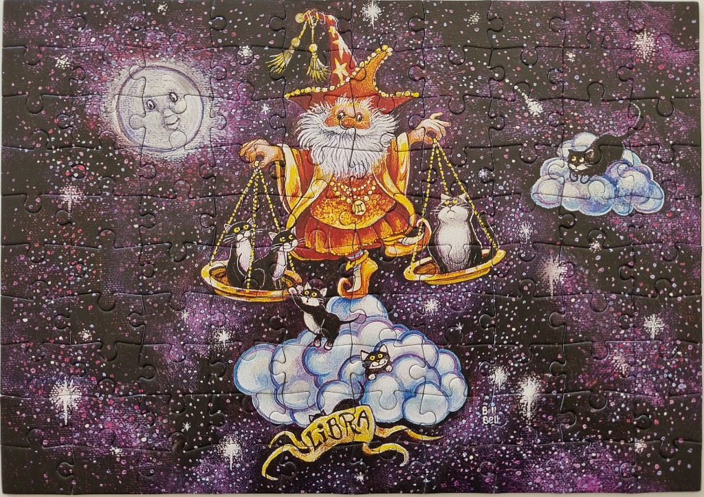 A whimsical illustration of a wizard representing the Libra zodiac sign surrounded by cats in a starry night sky.