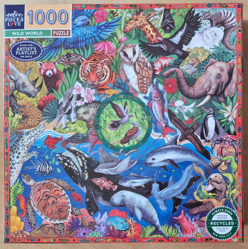 A dense illustration of various animals from land, sea, and air crowded into a colorful collage.