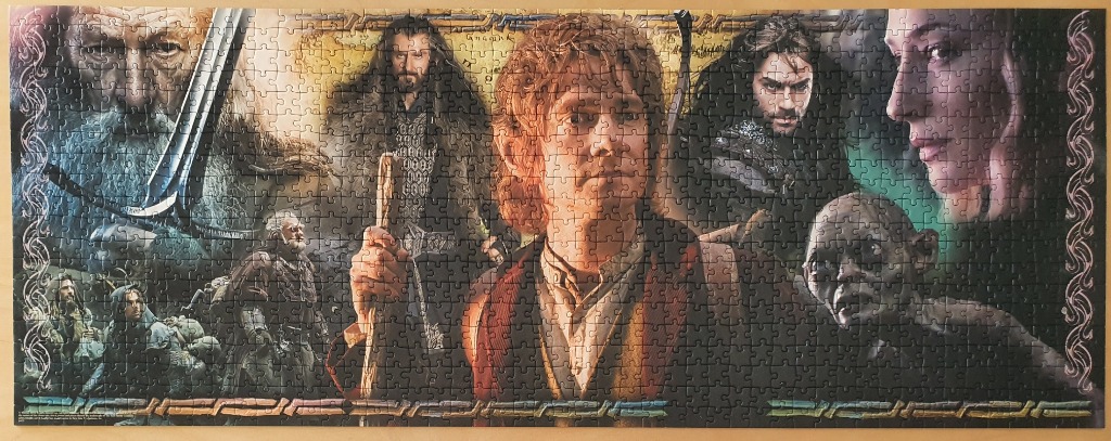 Panoramic fantasy illustration featuring key characters from The Hobbit film trilogy, including Bilbo, Gandalf, and Thorin.
