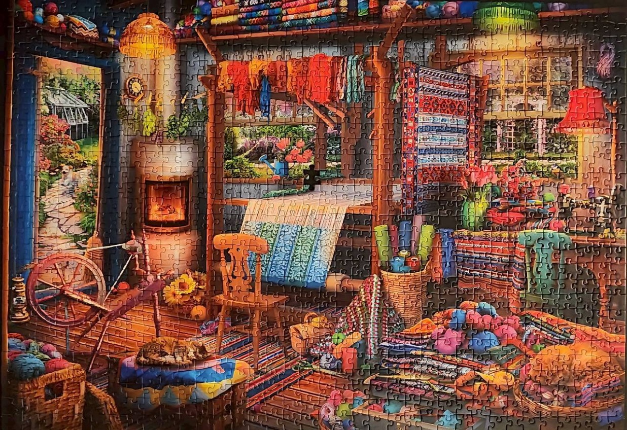 A cozy, vibrant fiber arts studio filled with yarn, a loom, and a spinning wheel in a rustic cottage setting.
