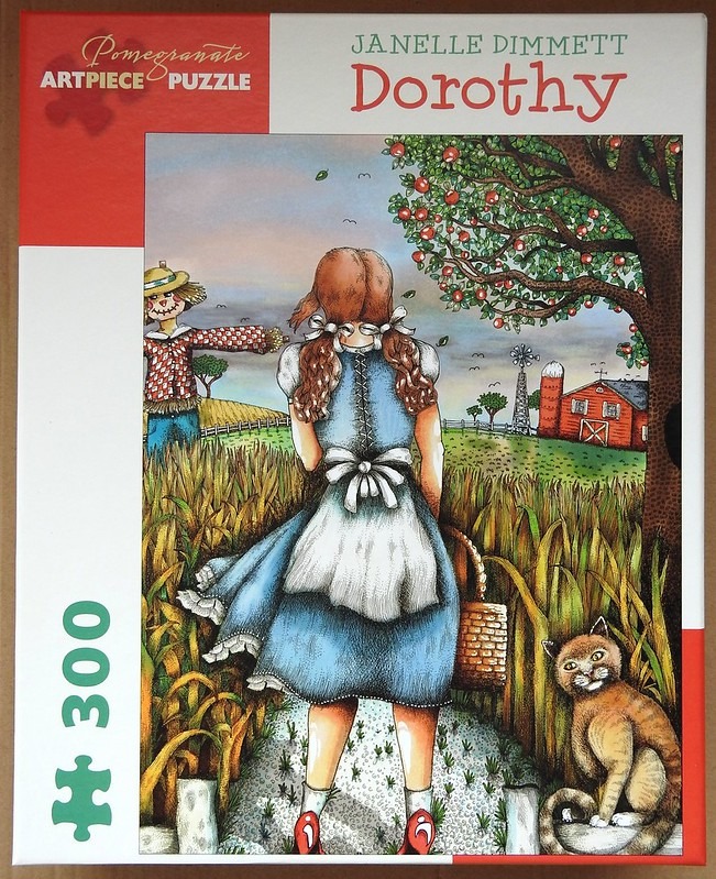 Illustration of a girl with red braids, a scarecrow, and a cat in a field near a barn at sunset