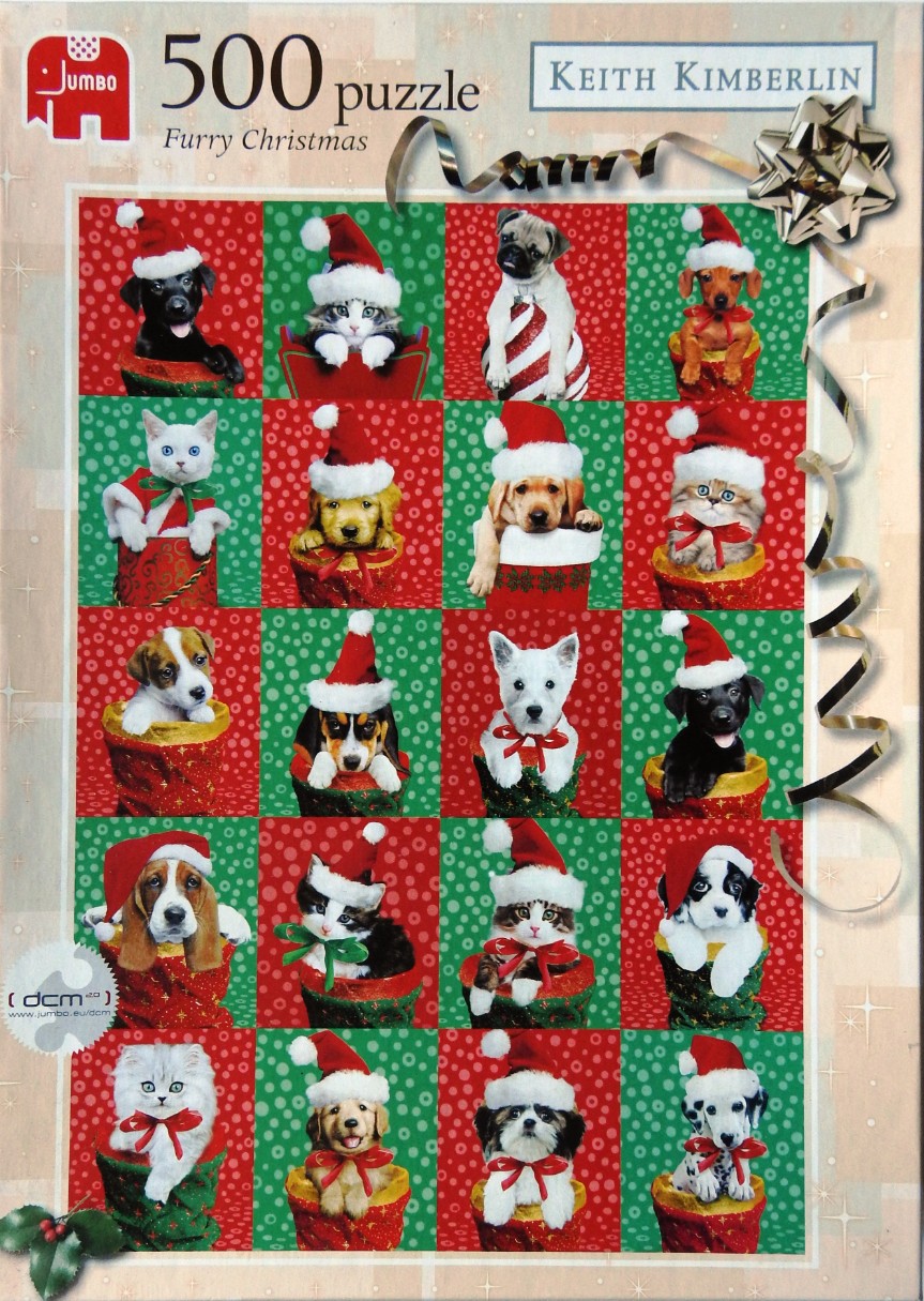 A collage of twenty different puppies and kittens wearing Santa hats and sitting in Christmas stockings.