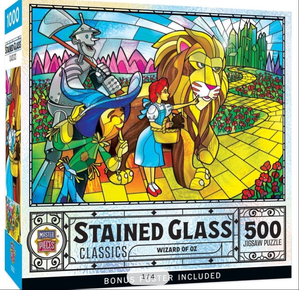 Stained glass style illustration of Dorothy, the Tin Man, the Scarecrow, and the Cowardly Lion on the yellow brick road.