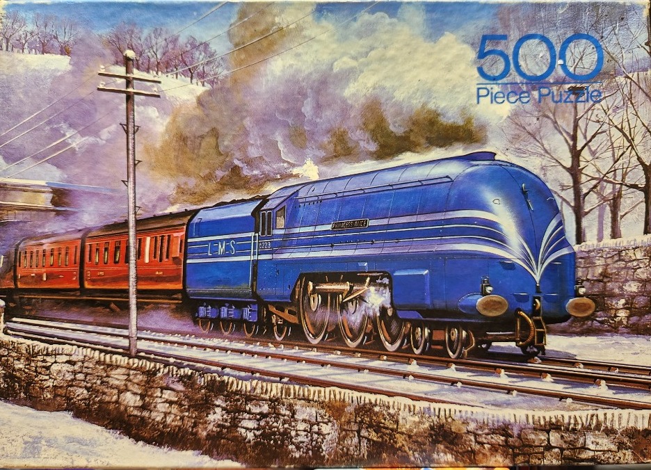 A blue LMS steam locomotive pulling red carriages through a snowy winter landscape