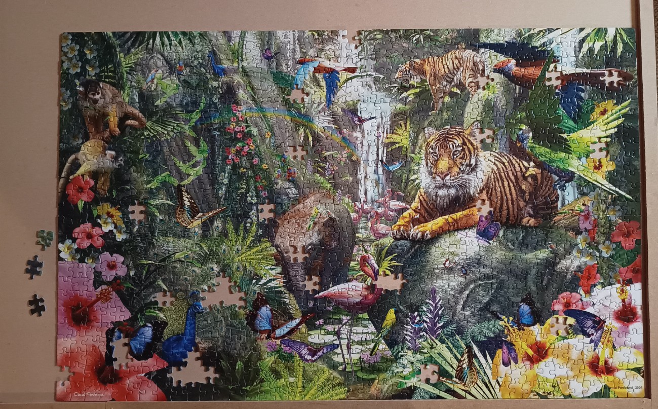 A lush jungle scene featuring a resting tiger, a panther, a flamingo, and various exotic birds and butterflies.