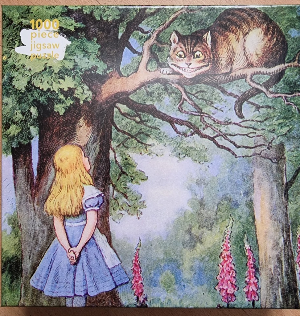 Illustration of a young girl in a blue dress looking up at a grinning Cheshire Cat in a tree.