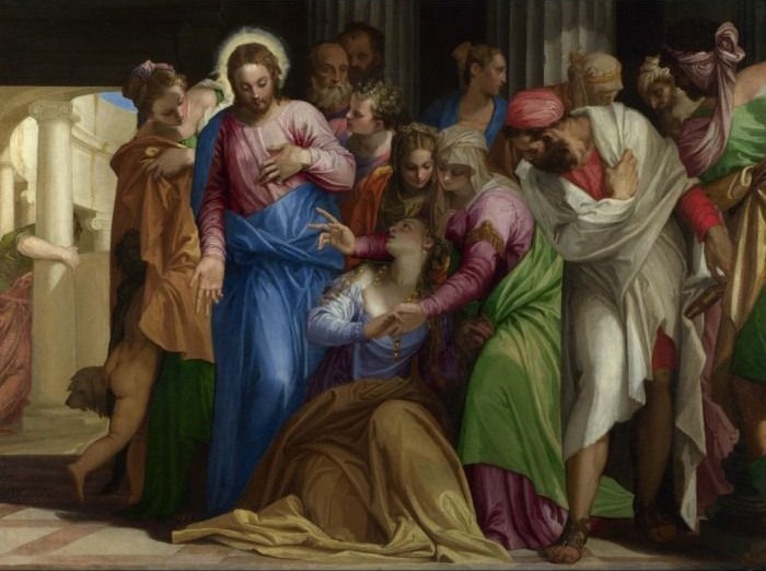 A classical oil painting depicting a central male figure with a halo, gesturing toward a kneeling woman surrounded by a crowd