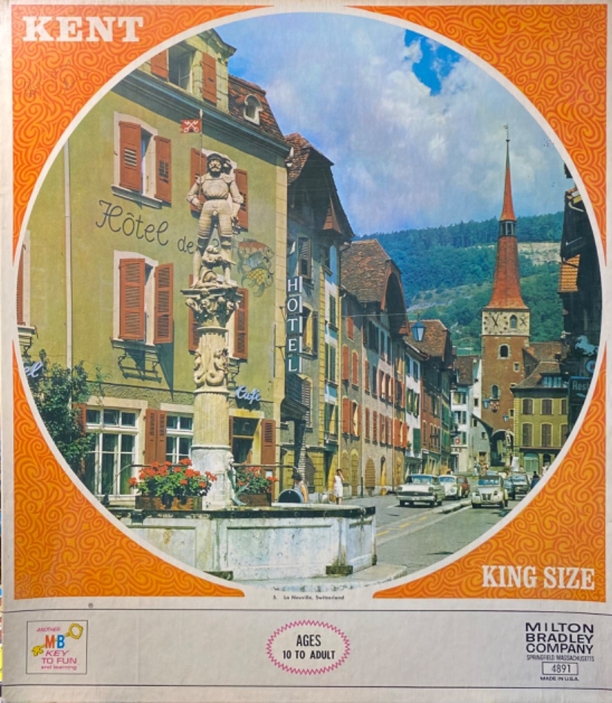 A sunny street scene in La Neuville, Switzerland, featuring a historic fountain and European architecture.