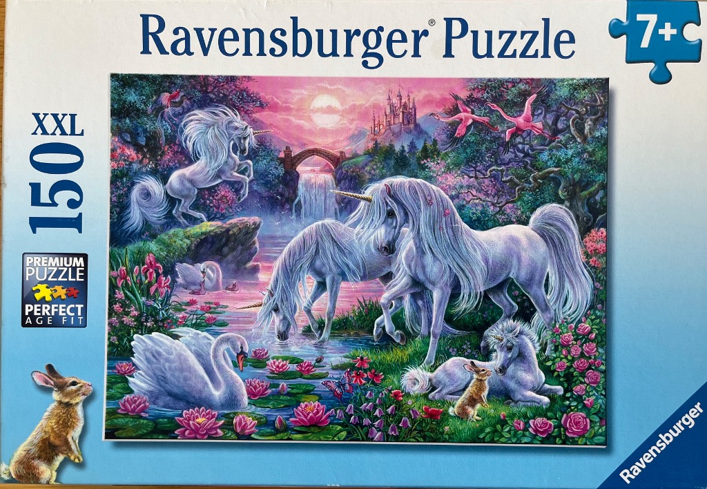 Fantasy illustration of unicorns, swans, and a castle in a vibrant pink sunset landscape.