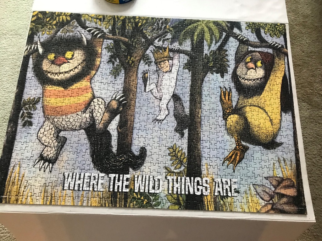 Illustration of Max and two Wild Things from Where the Wild Things Are in a forest setting
