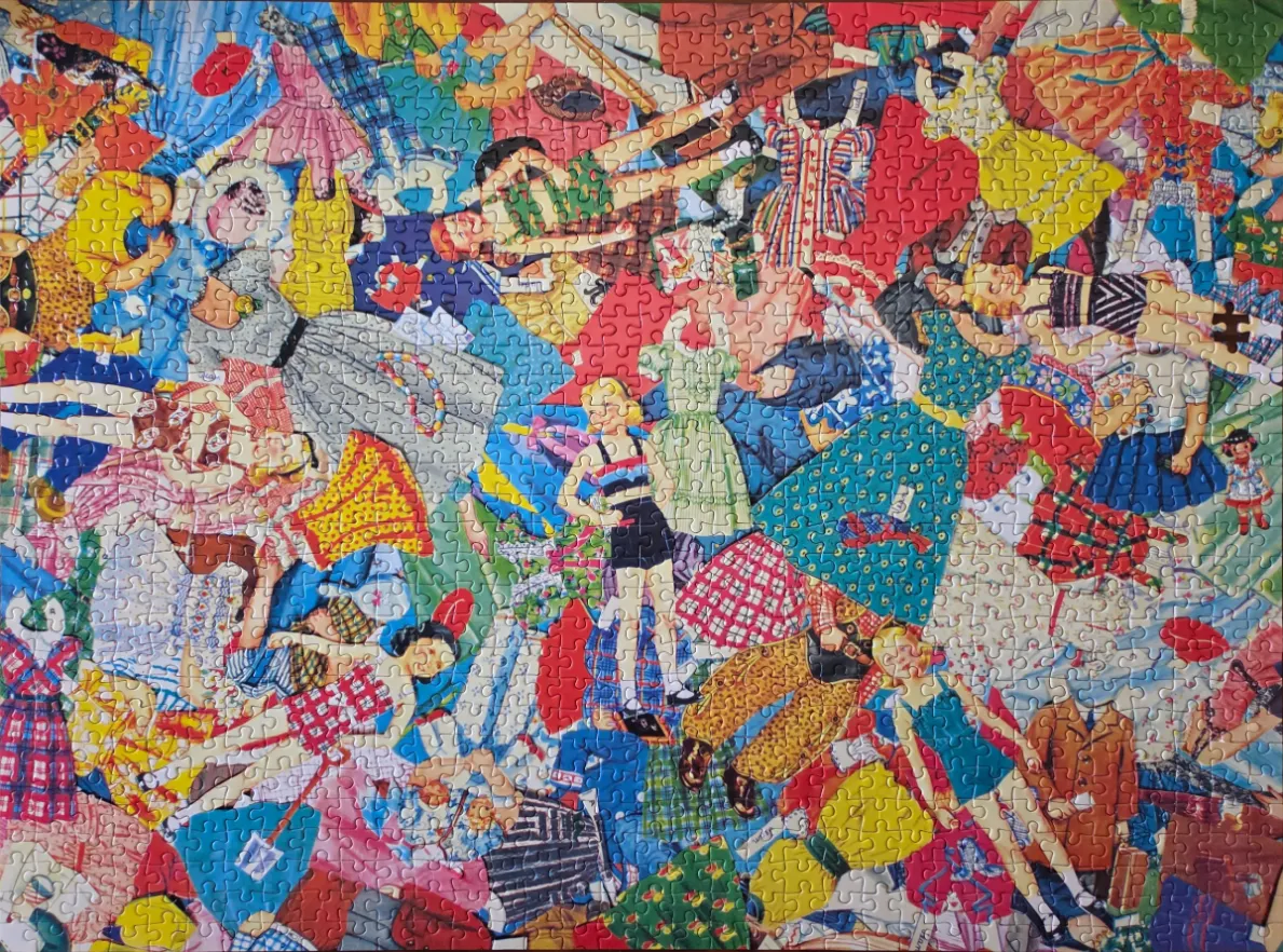 A colorful collage of vintage paper dolls and fashion outfits