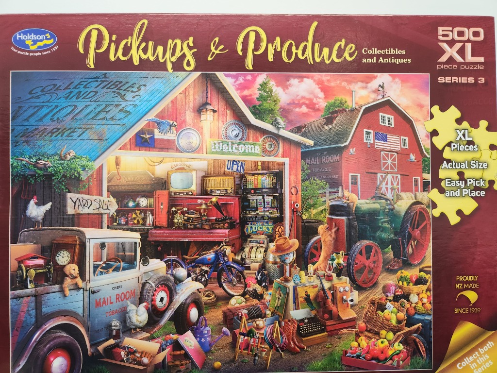 A colorful, detailed outdoor market scene featuring an old truck, vintage items, and a red barn at sunset.