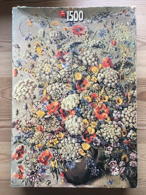 A lush, detailed oil painting of a vibrant wildflower bouquet featuring poppies, cornflowers, and Queen Anne's lace.