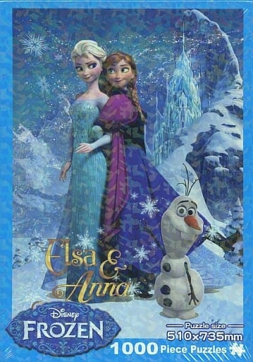 Elsa, Anna, and Olaf from Frozen standing in a snowy landscape with an ice palace in the background.