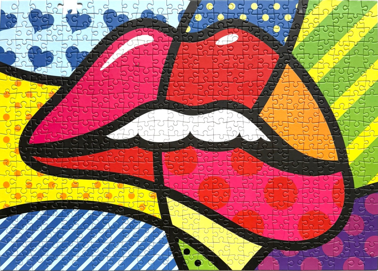 Pop art style illustration of a stylized pair of lips with bold black outlines and colorful patterned backgrounds.