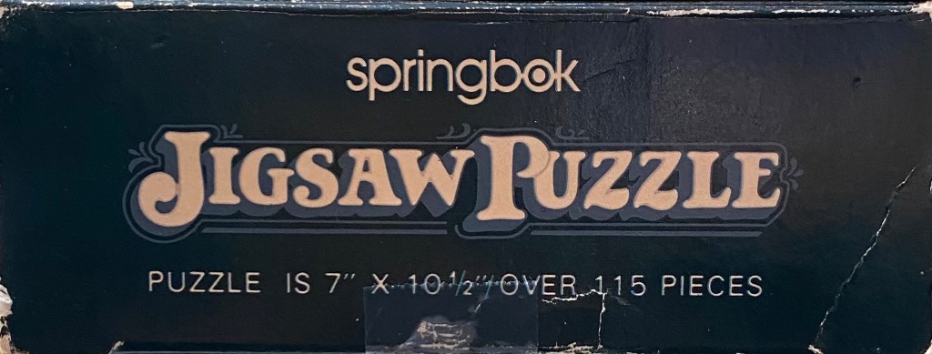 Vintage Jigsaw Puzzle box: JIGSAW PUZZLE text in decorative font, over 115 pieces.
