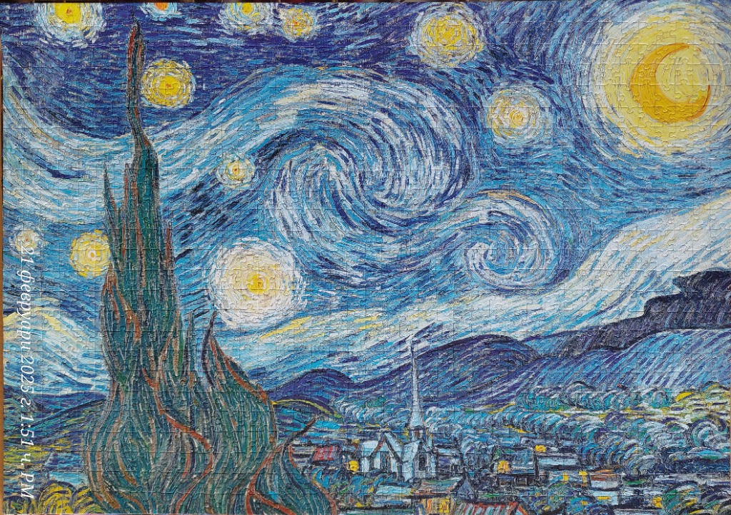 A reproduction of Vincent van Gogh's The Starry Night painting.