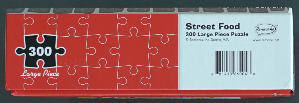 Street Food 300 Large Piece Puzzle, bright red with white piece outlines.