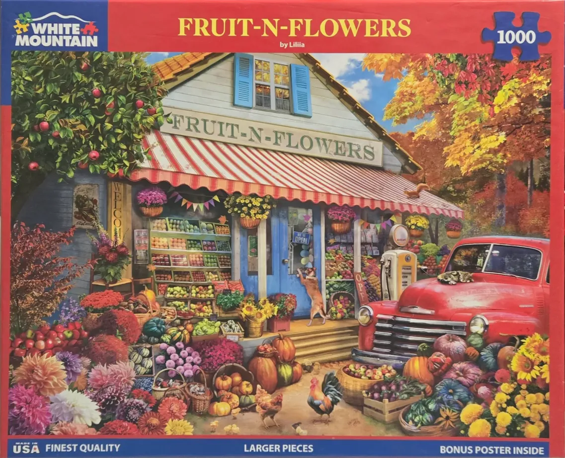 A vibrant autumn scene featuring a rustic produce stand called Fruit-N-Flowers, complete with a red vintage truck.