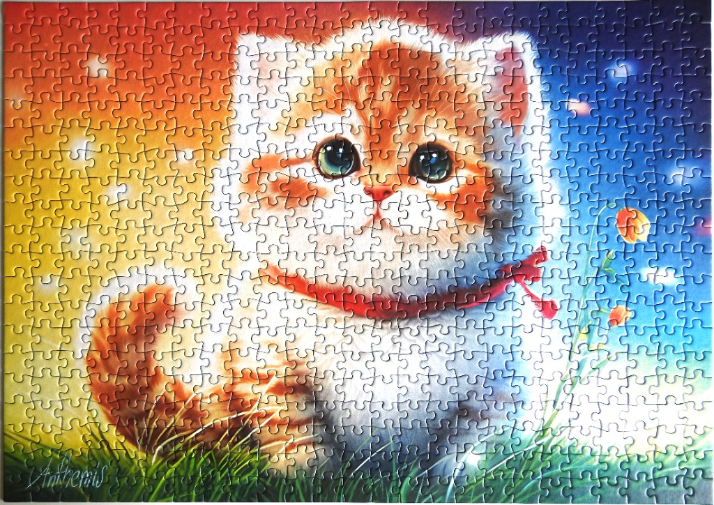 A fluffy ginger kitten with large, soulful eyes sitting in a meadow against a twilight sky.