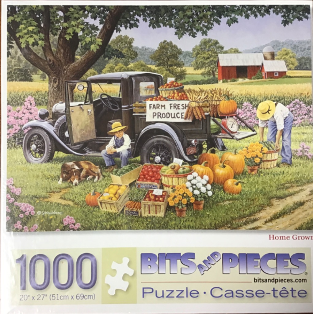 A vintage black pickup truck loaded with produce at a farm market with a boy and his dog.