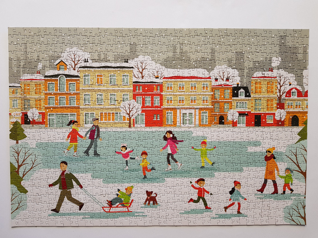 An illustration of people ice skating and sledding in a snowy city park lined with colorful buildings.