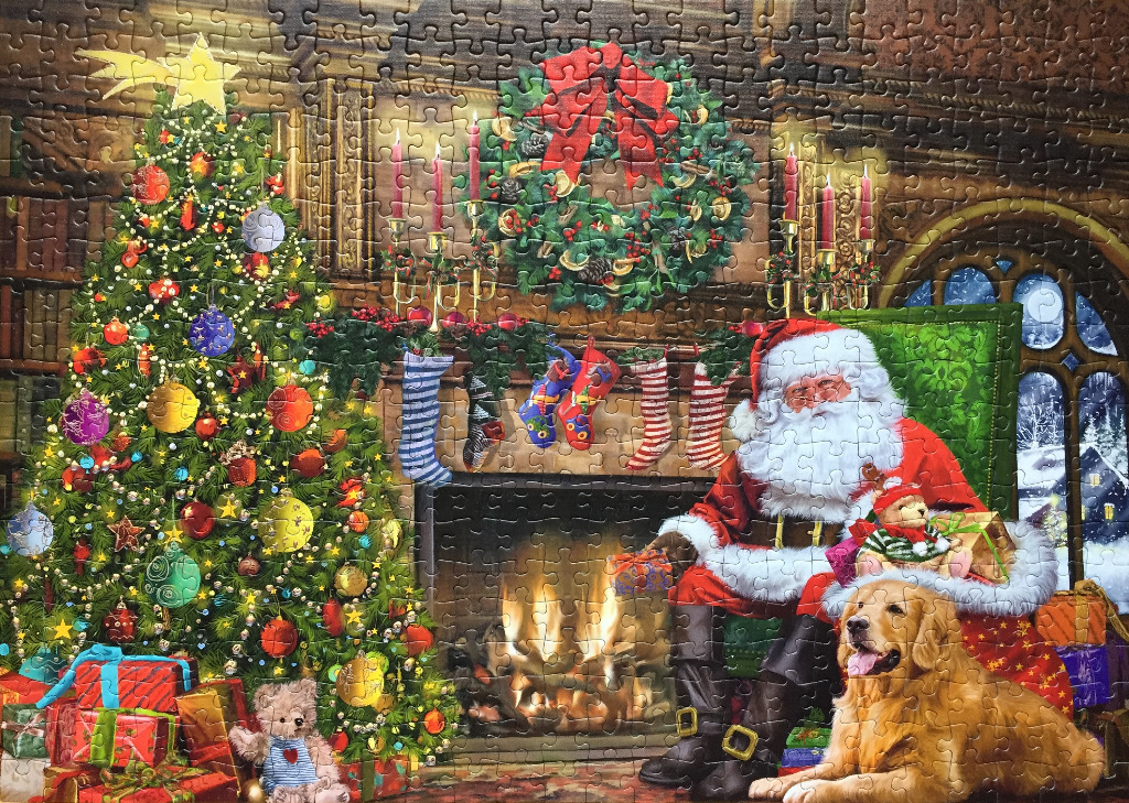 Santa Claus sitting by a cozy fireplace next to a decorated Christmas tree and a golden retriever