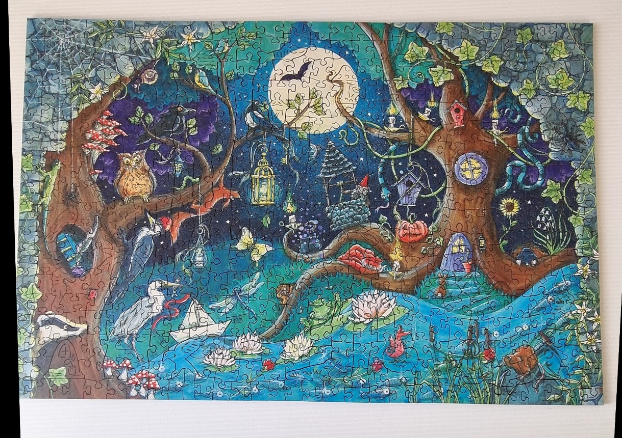 An enchanted forest scene at night with a full moon, owls, and a whimsical stream.