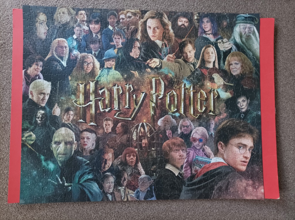 A collage of characters from the Harry Potter film series with the main title centered.