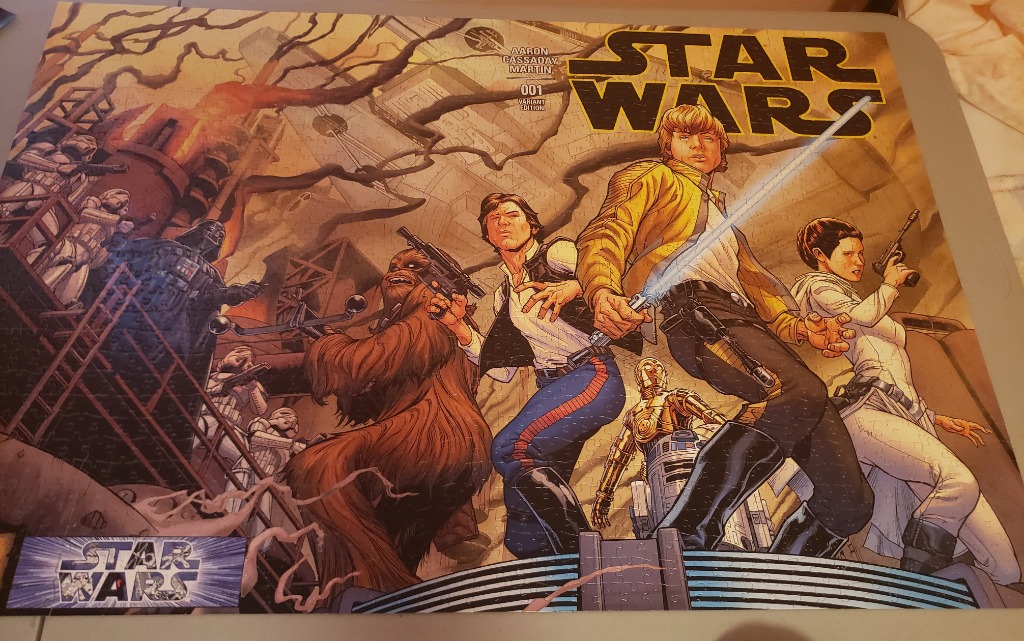 Comic book cover art featuring Star Wars characters including Luke, Han, Chewbacca, and Princess Leia.