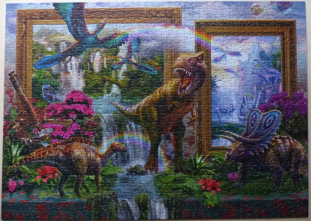 A vibrant fantasy illustration of various dinosaurs within a lush, magical landscape featuring ornate picture frames.